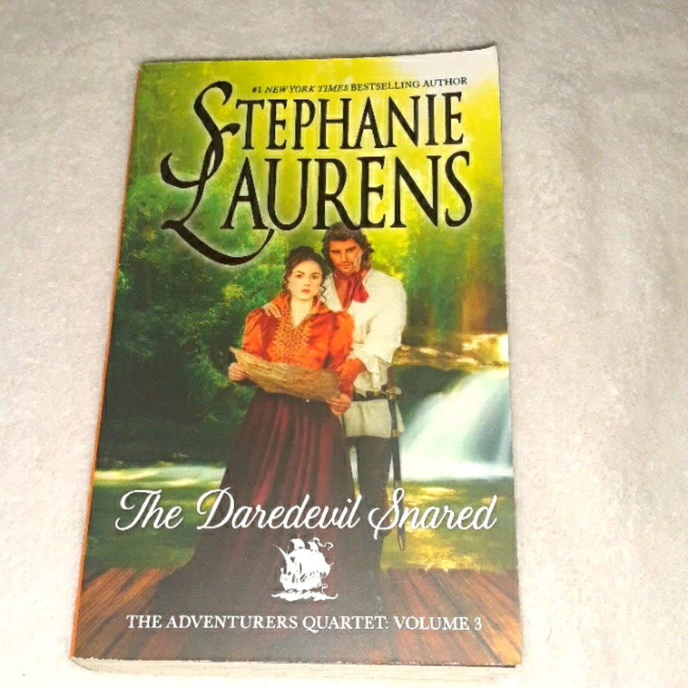 The Daredevil Snared, a paperback book written by Stephanie Laurens in 2016